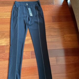 Indigo Orly skinny leg dress pant. Stylishly tailored with beautiful detailing